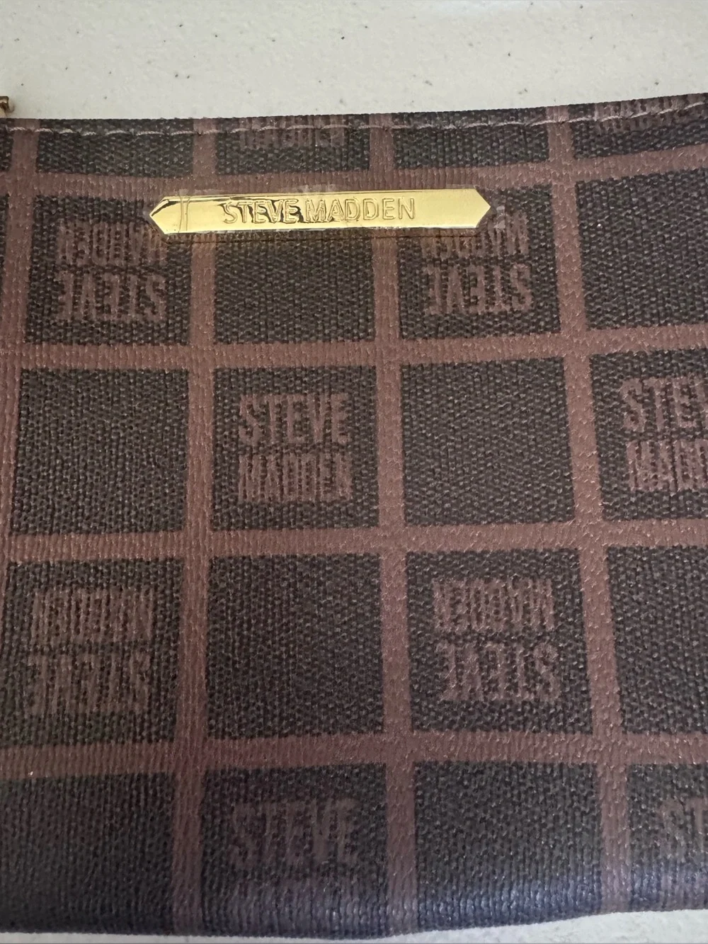 Steve Madden Brown Monogram Wristlet Pouch with Gold Plate